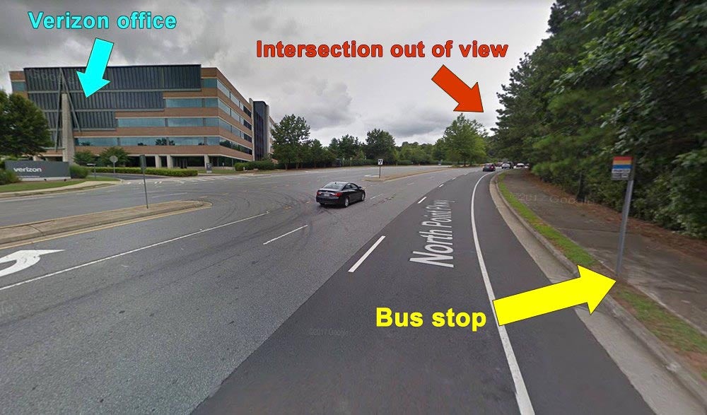 Photo of bus stop and intersection around the corner