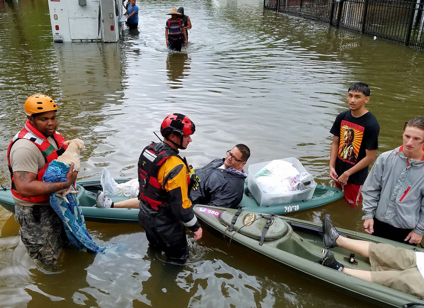 Men in a boat during a flood