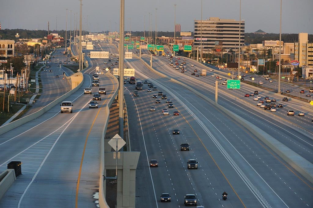 I-10, post-expansion, is now vastly wider with no room available on the side of the existing roadway for a rail line.