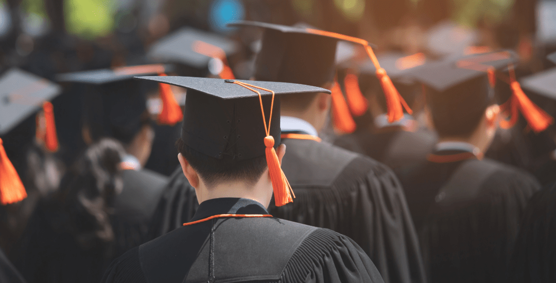 Students attend a graduation ceremony