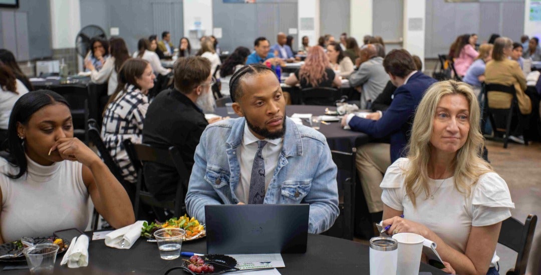 Participants discuss food insecurity issues at the 2026 Community Health Summit.