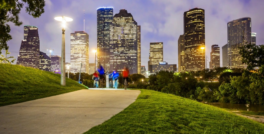 Houston skyline from a park in the evening.