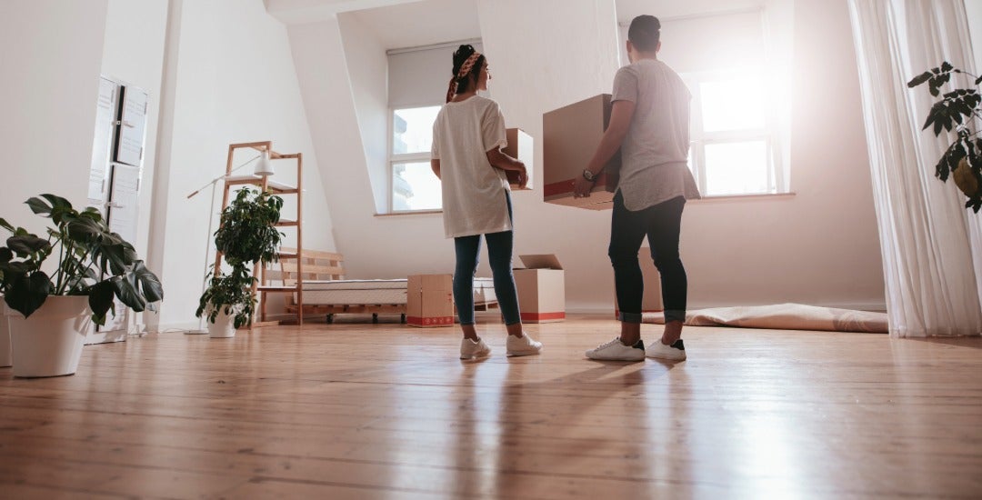 A young couple moves into a new home.