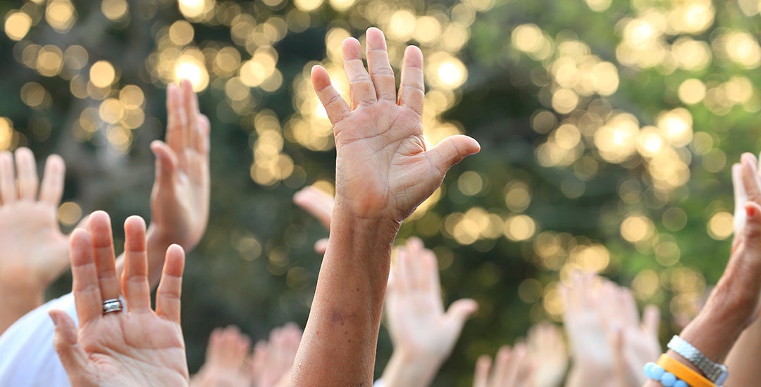 people participating by raising thier hands
