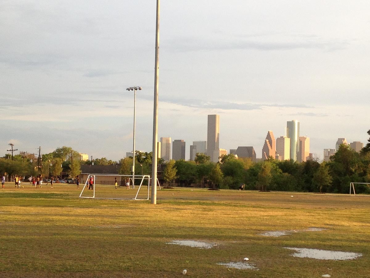Soccer fields with the Houston skyline in the background