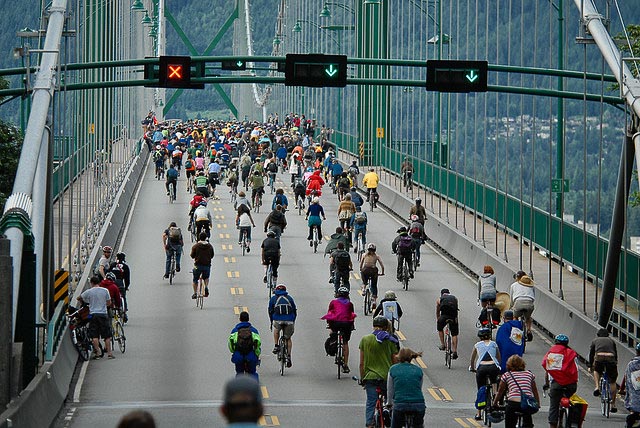 Bikers crossing a bridge in Vancouver