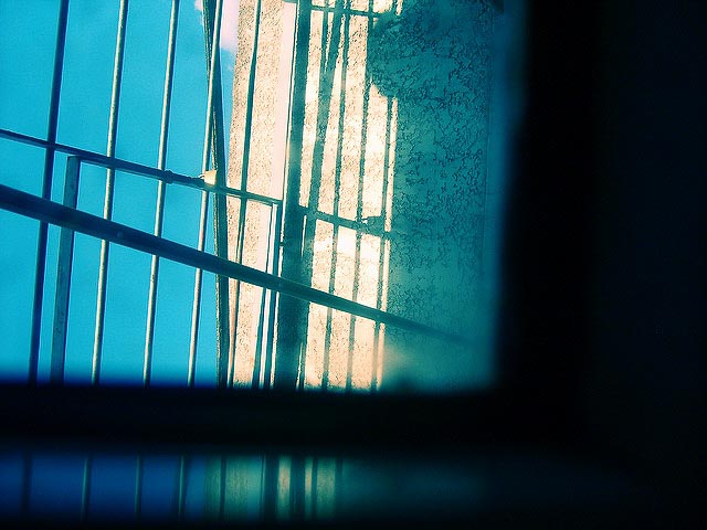 Jail bars through a photo