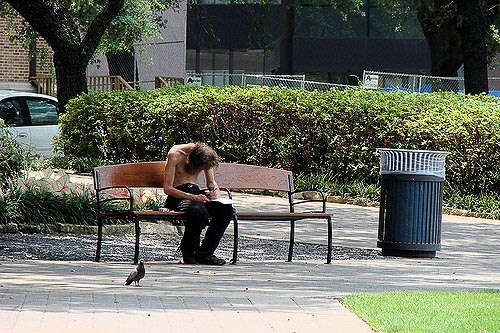 Homeless man on a bench