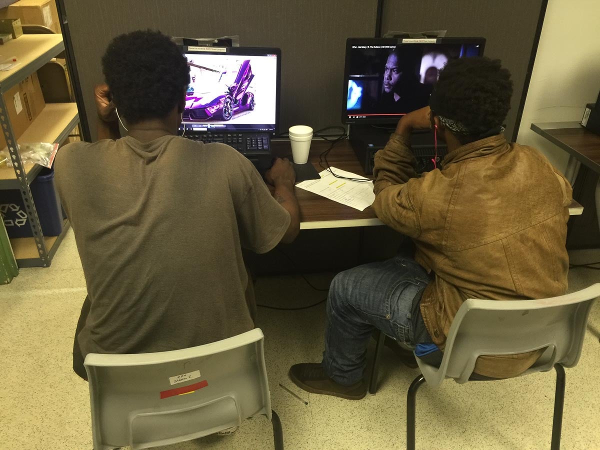 Visitors are able to use the computers in the resource center.