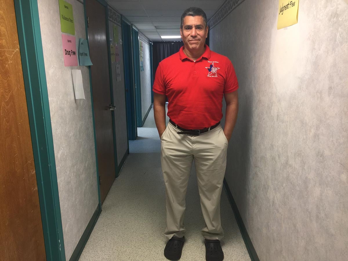 Rafael Sarango stands in the youth resource center