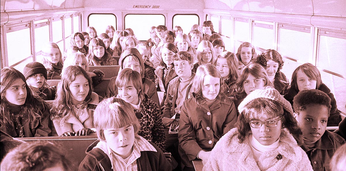 Students ride the bus from the suburbs to school in Charlotte, North Carolina, in 1973, as part of school desegregation efforts. 