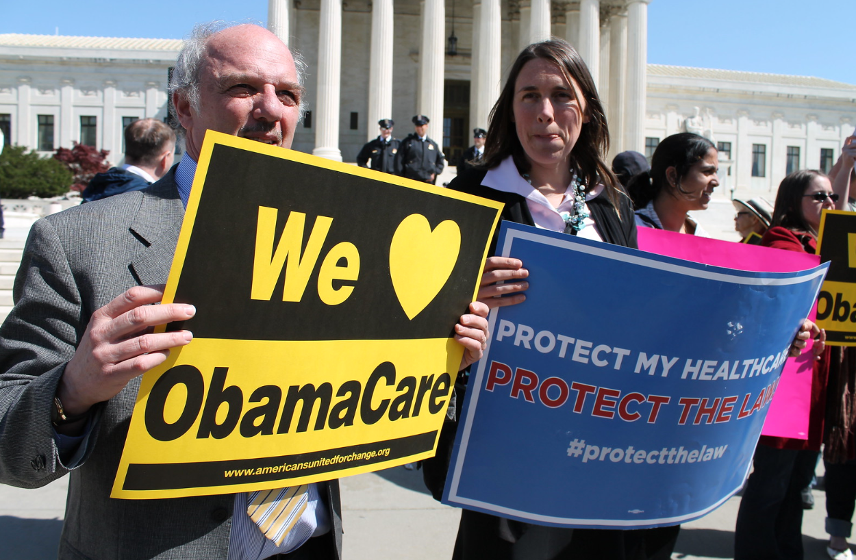 People in support of the ACA at a health care rally 2012