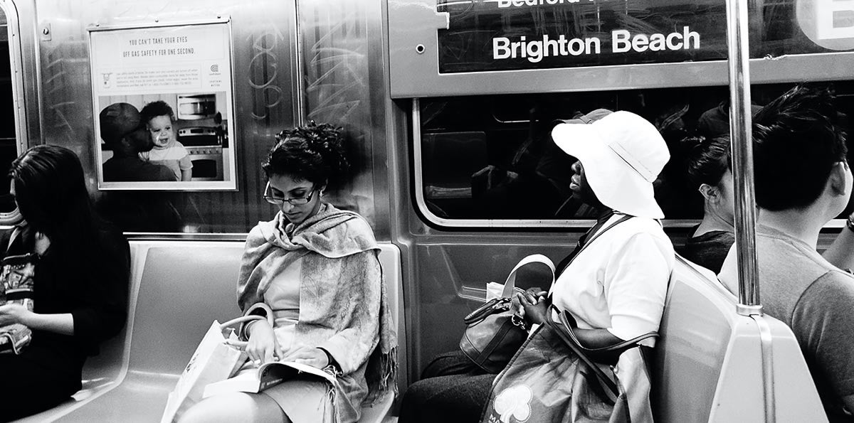 People riding the subway in New York