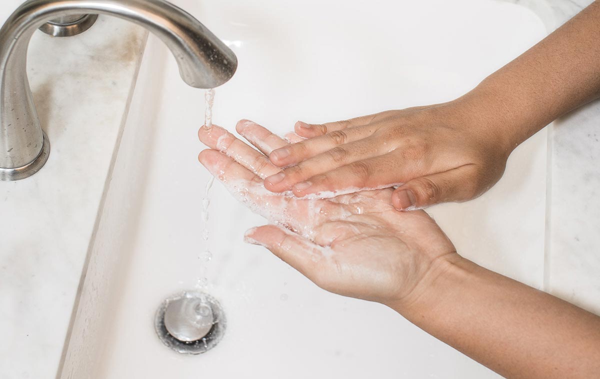 washing hands to fight the spread of infection