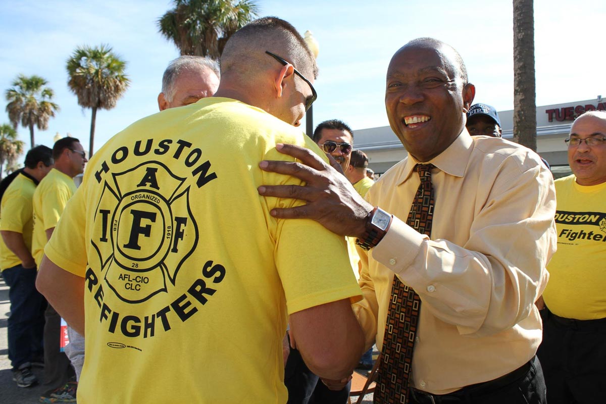 Firefighters with Sylvester Turner
