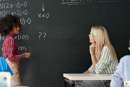 Student solving equations