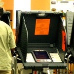 A line of voting booths.