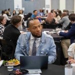 Participants discuss food insecurity issues at the 2026 Community Health Summit.