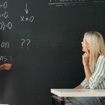 Student solving equations