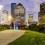 Houston skyline from a park in the evening.