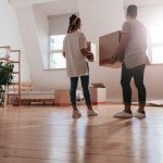 A young couple moves into a new home.