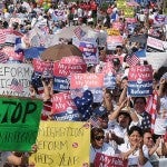 People protesting with signs