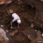 Man working in an archaeological dig site
