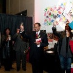 Former mayor of Baton Rouge Kip Holden cheers with others
