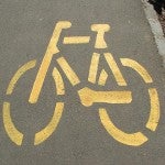 Bike sign spray painted on the pavement 