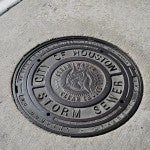 Close-up of a Houston man-hole cover