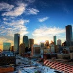 The sunrise behind the Houston skyline