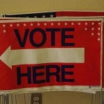 Vote here sign