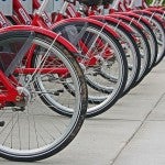 Bike share bicycles lines up in a row