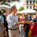 Eric Garcetti handshaking another man