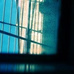 Jail bars through a photo