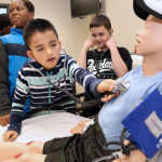 Boys playing with stethoscopes 