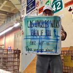 Sign saying, "Los Angeles walks even if you don't see us."
