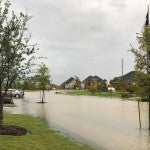 Flooded neighborhood street in Clear Lake