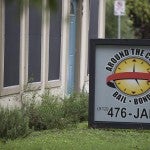 Around the clock bail bonds sign