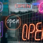 many neon open signs
