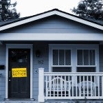 House with eviction notice on door