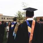 Generic graduation photo featuring a recent graduate