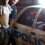 Houston police officers arrest a man