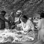 A local church hosts a picnic during County Line's 1991 homecoming. The three-day event, which still takes place today, honors the Texas freedom colony's history and residents — past, present, and future. Photo by Richard Orton.