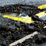 Image of large pothole on a road