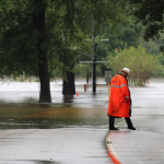 Man in flooded road