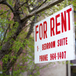 For rent sign hanging outside apartment