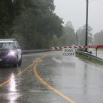 Police car blocking road due to high water