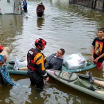 Men in a boat during a flood