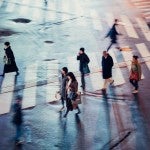 people walking across the street